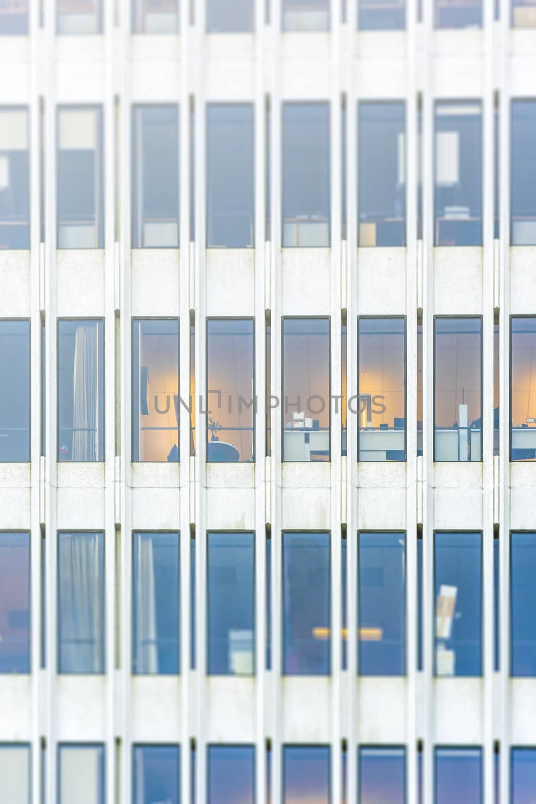 Windows on a modern office building in a sunny day with Tilt-Shift effect