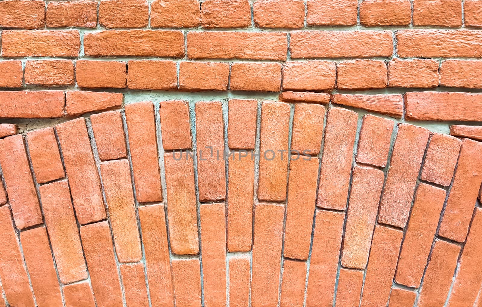 Fragment of a red brick wall with an arch. by zeffss