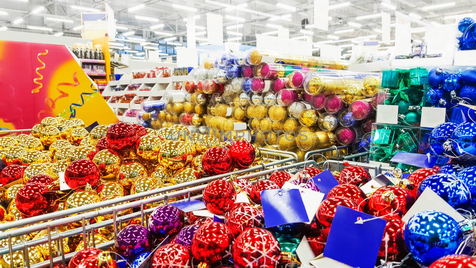 Colored Christmas toys in store. Christmas decorations.