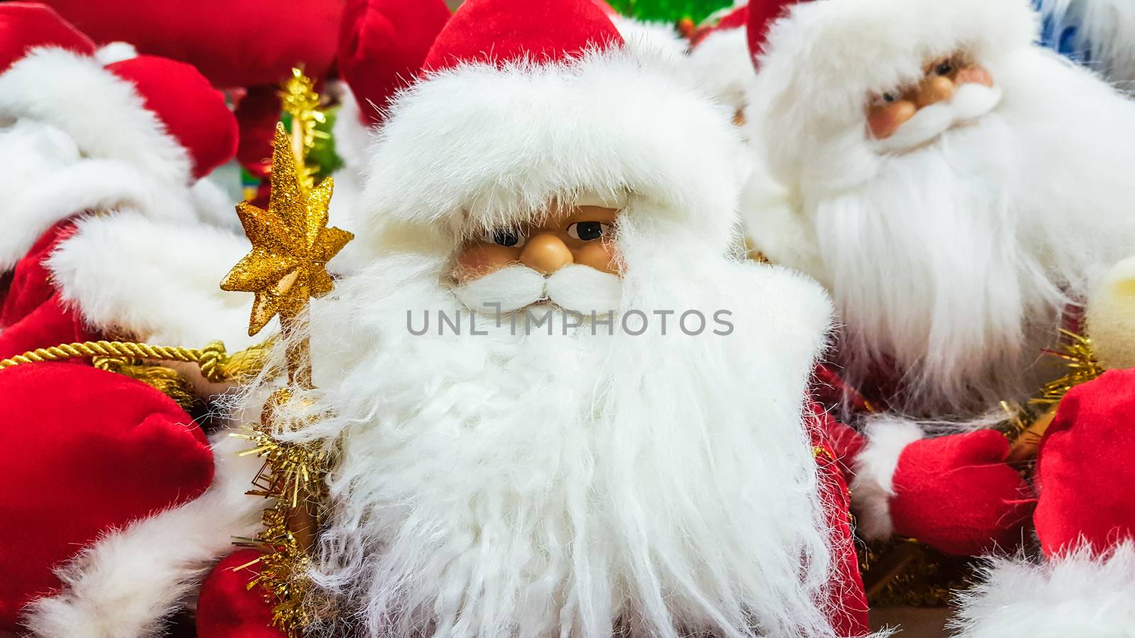 Santa Claus toy in supermarket. Christmas eve