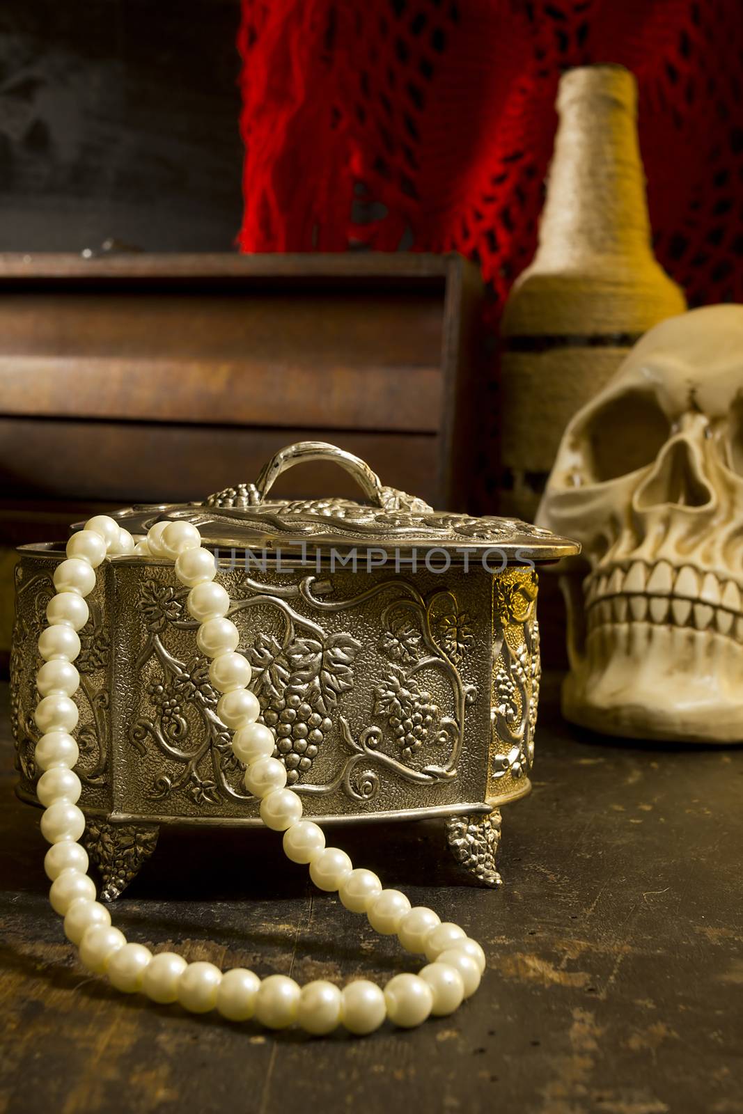 Vintage jewelry box on a wooden table