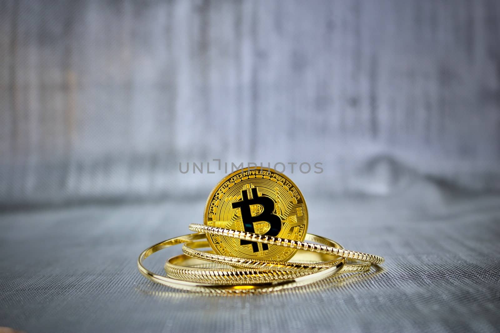 Cryptocurrency physical gold bitcoin coin in gold rings