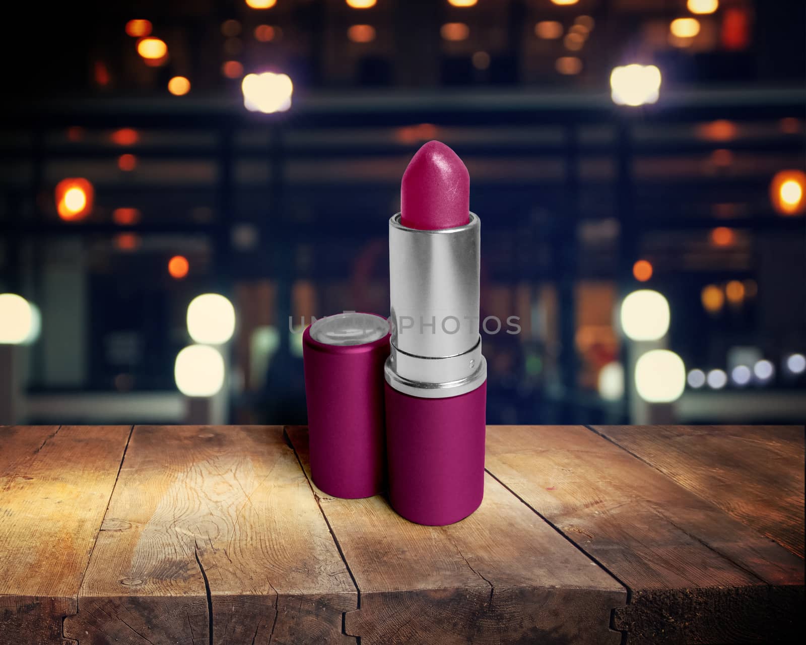 lipstick closeup on wooden table