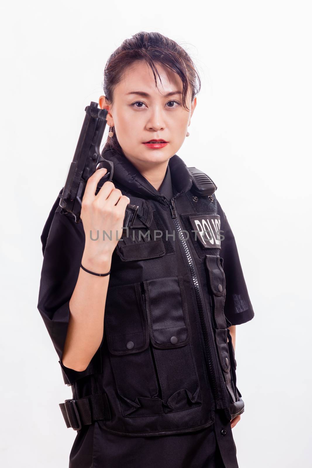 Chinese female police officer with handgun