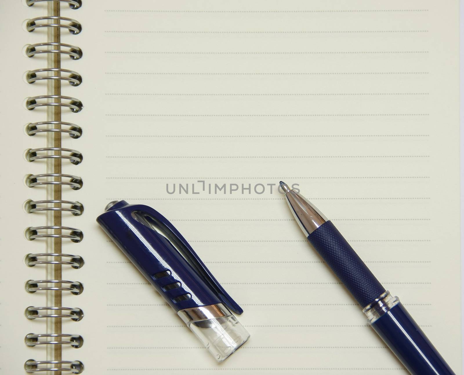 blue pen on notepad with spiral for memo, note, write, draw, text and picture
