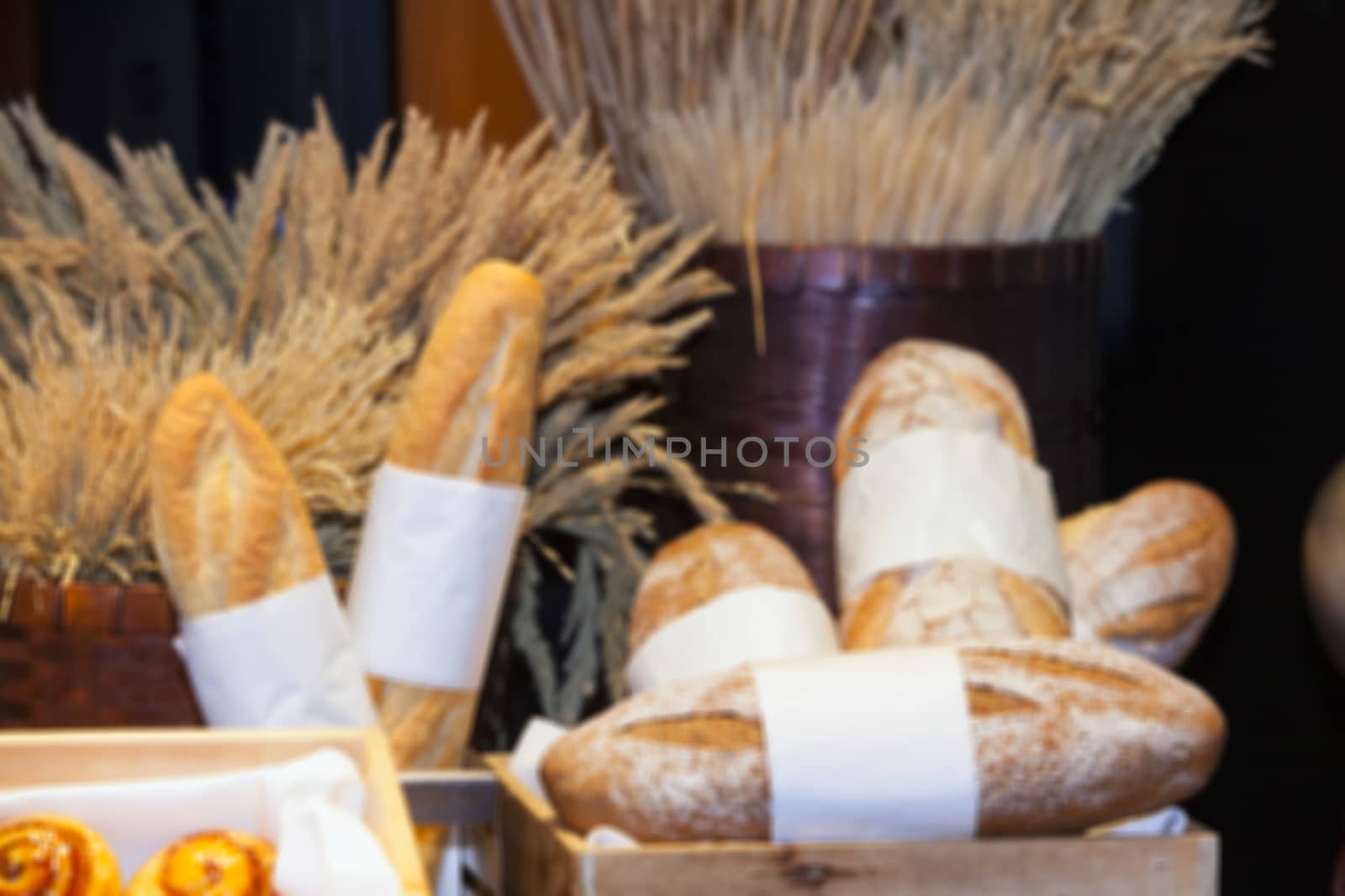 Bakery, two pieces is the staple food of the people and the background wheat,The background image blur.