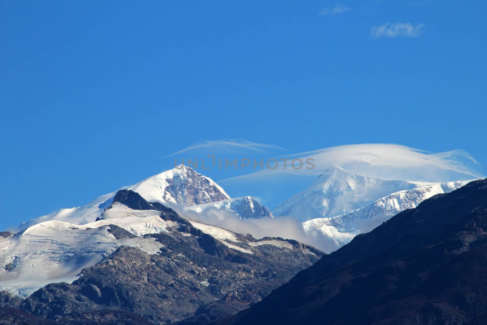 Typical foehn clouds, altocumulus lenticularis lent, in the mountains, Patagonia, Chile