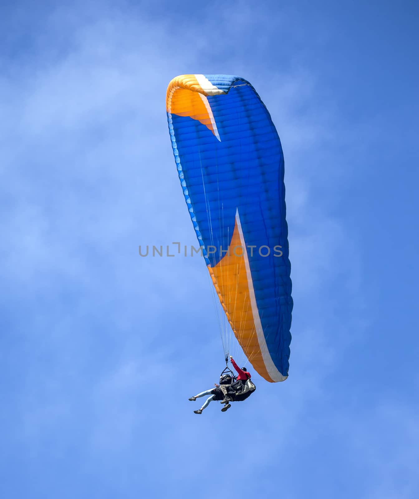 This is an image of a paraglider over Muscle Beach along California’s central coast.  Muscle beach is located in Pacifica, California, which is a prime spot for paragliding due to its fantastic weather conditions and views. 