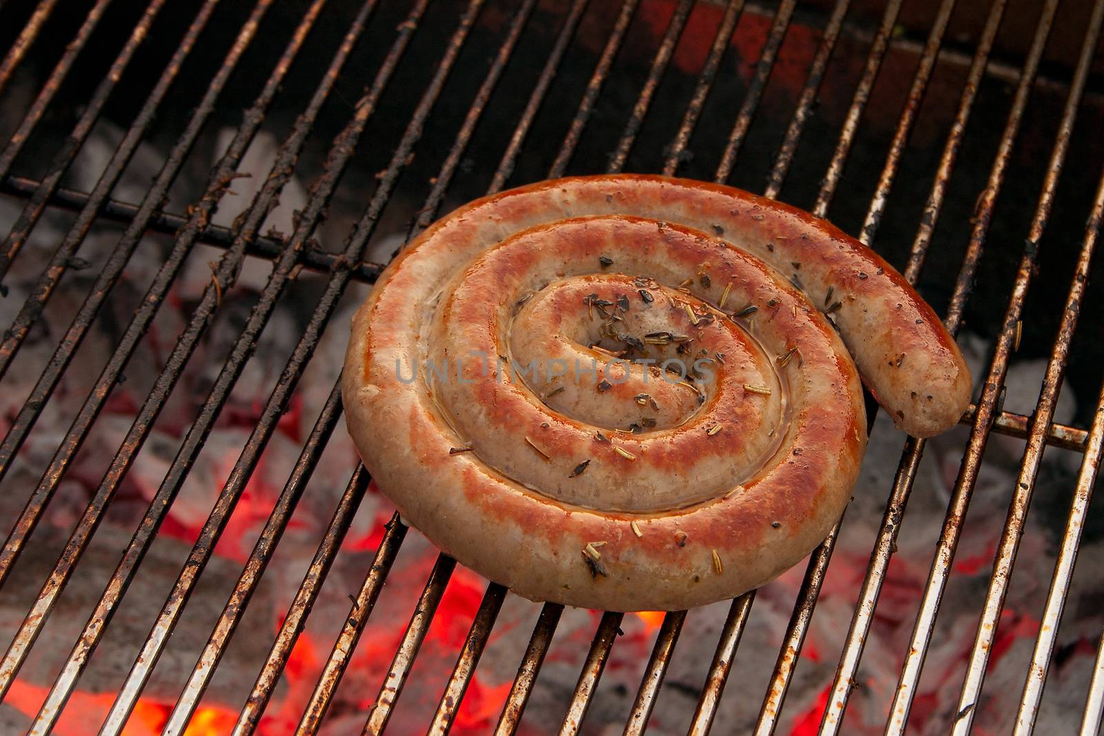 Cooking tastetful meat on a barbecue outside in the garden