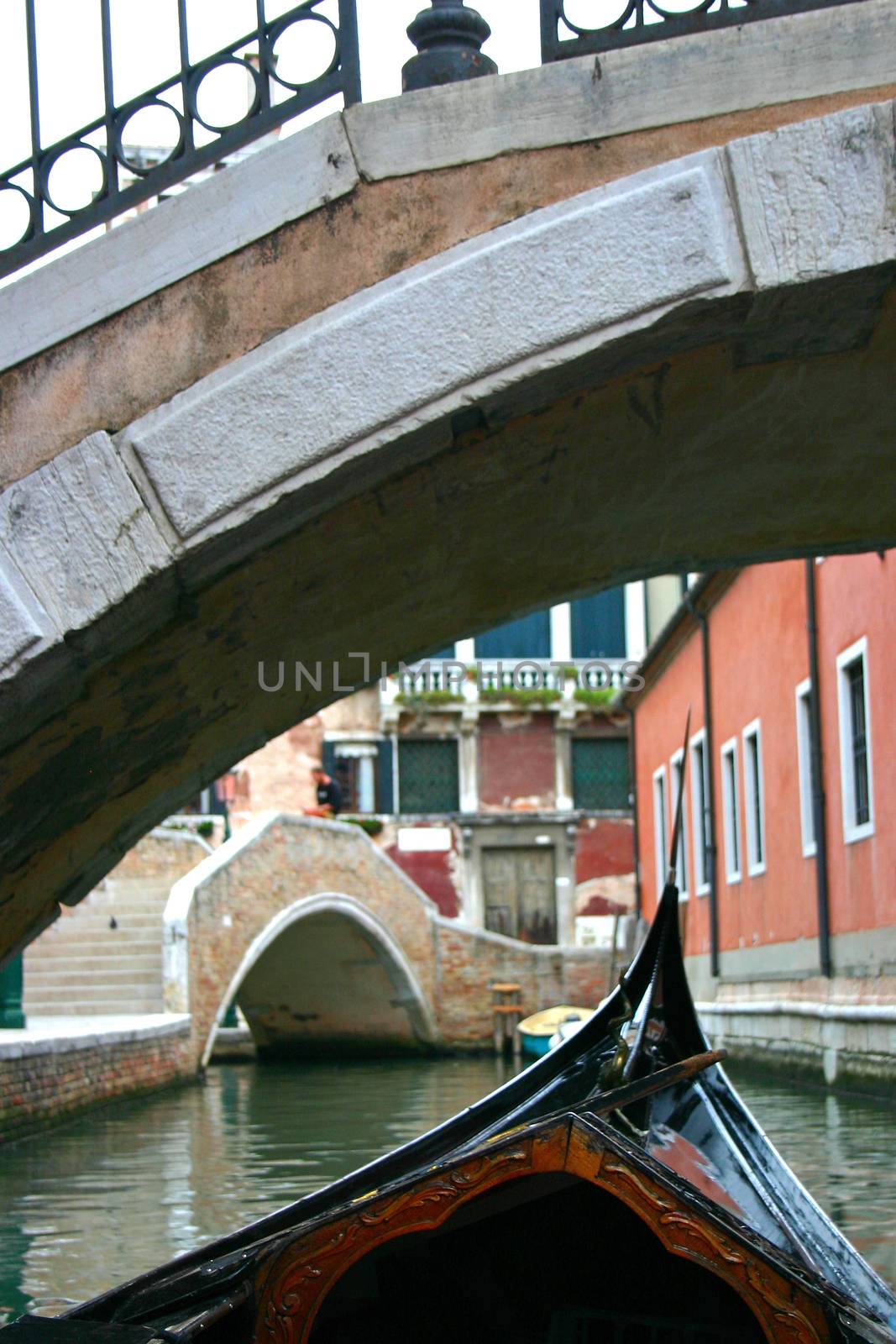 Gondola in the small canals of the romantic Venice