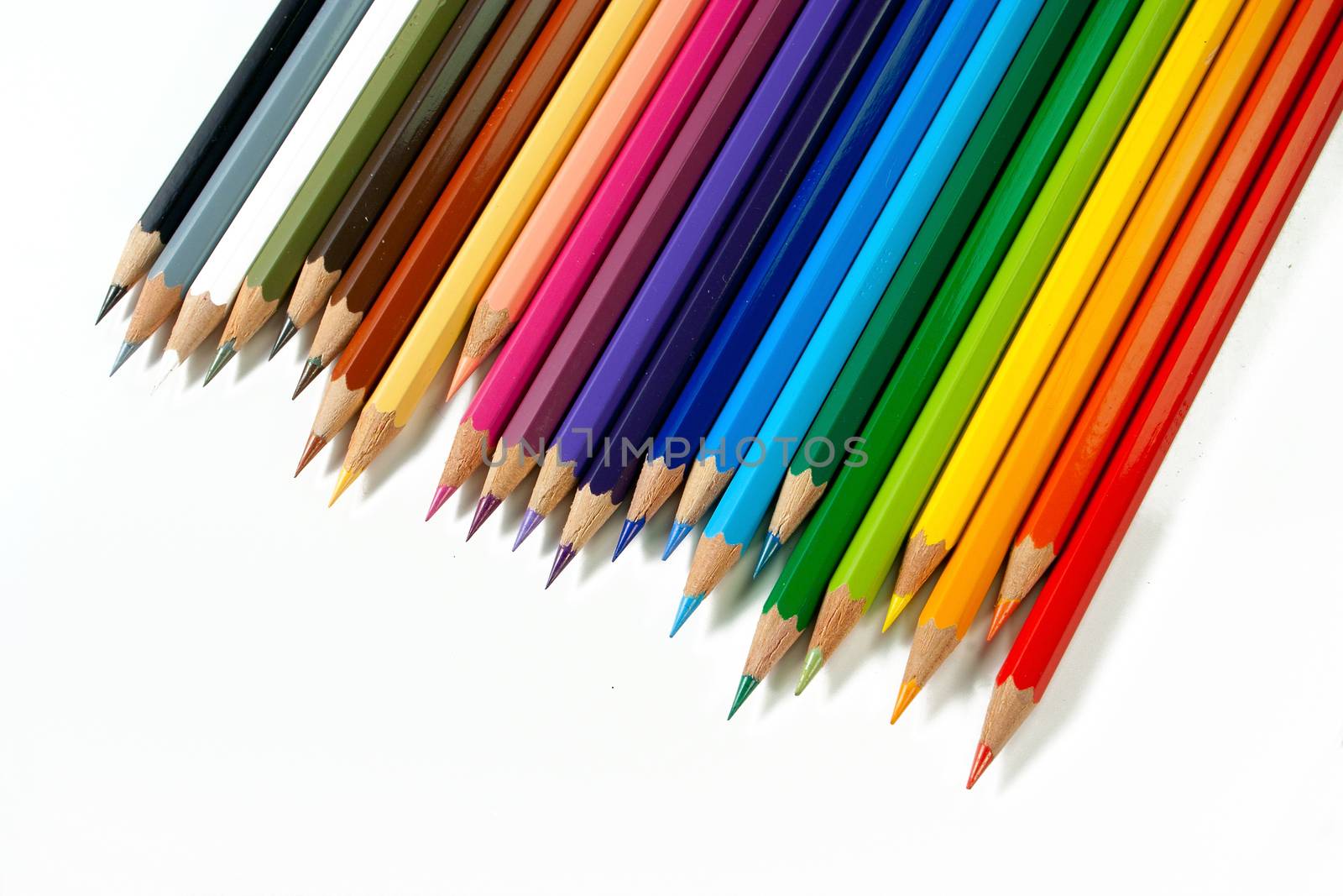 An assortment of color pencils on white background