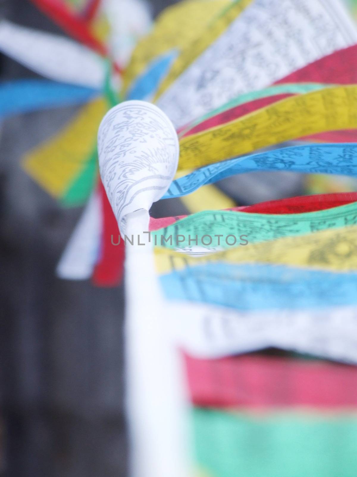 Colorful Tibetan Buddhism prayer flags - selective focus