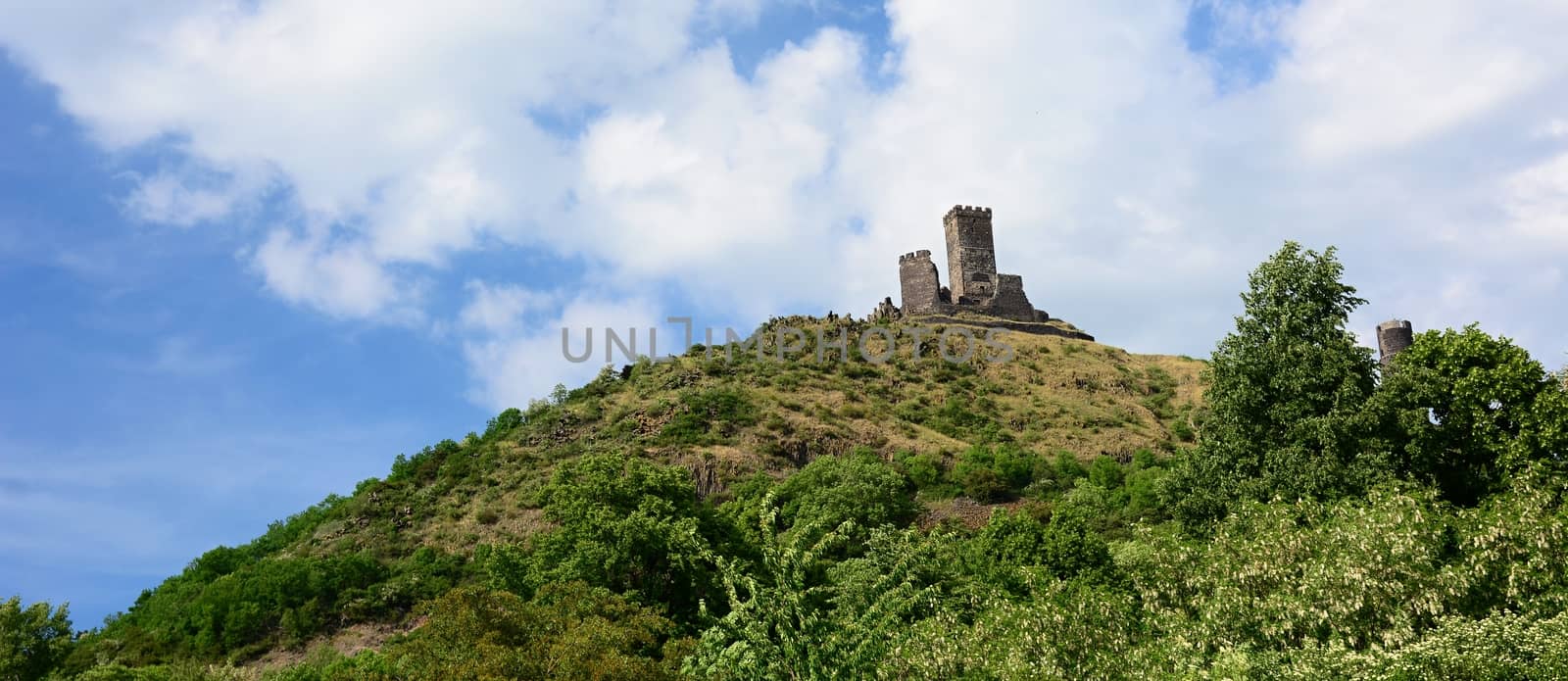 Hazmburk castle on a hill in Czech Central Mountains.