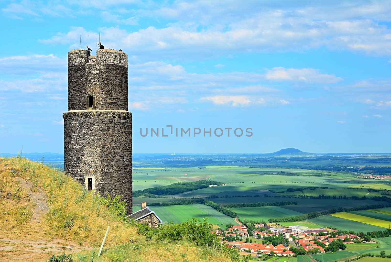 Hazmburk castle on a hill in Czech Central Mountains.