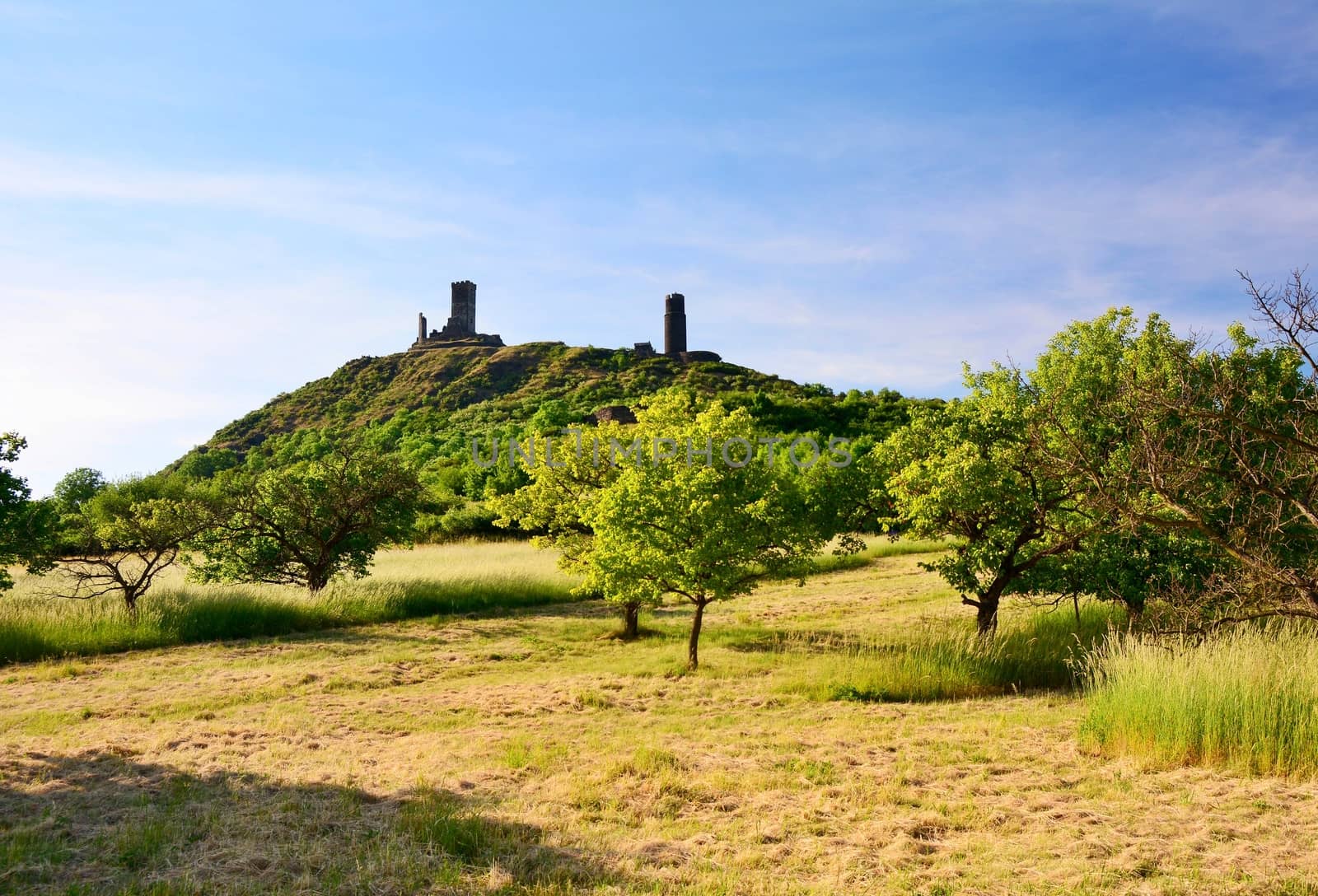 Hazmburk castle on a hill in Czech Central Mountains.