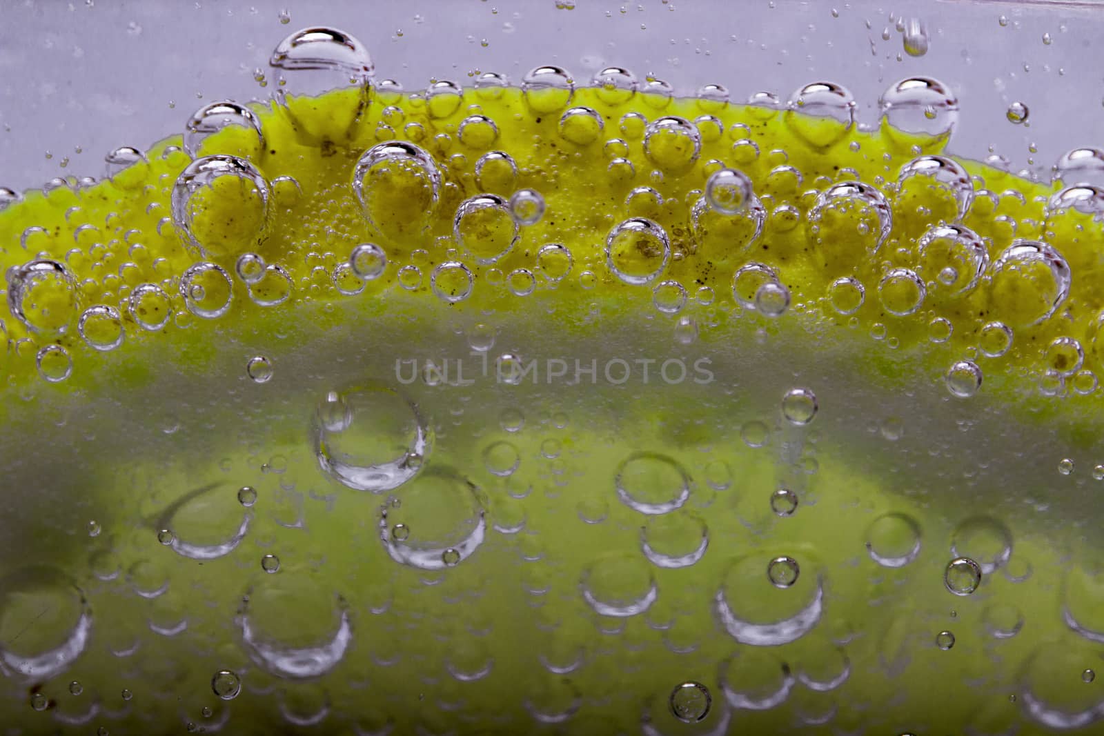 Slice Of Lemon In Mineral Water Bubbles 