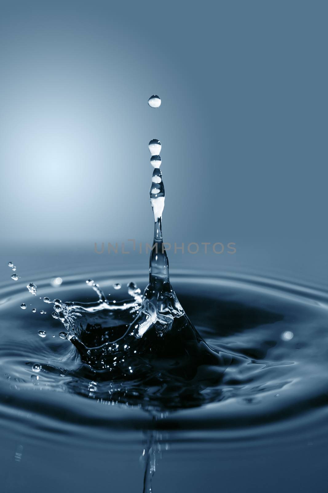 Nice abstract blue water splash on gradient background