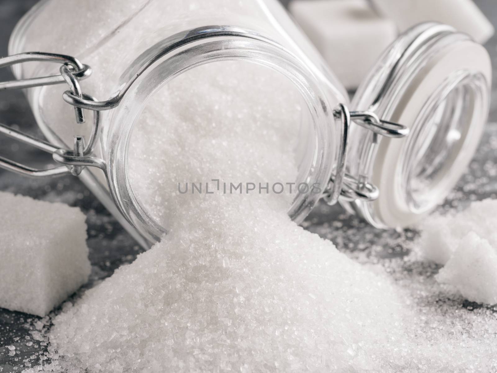 Granulated sugar in glass jar by fascinadora