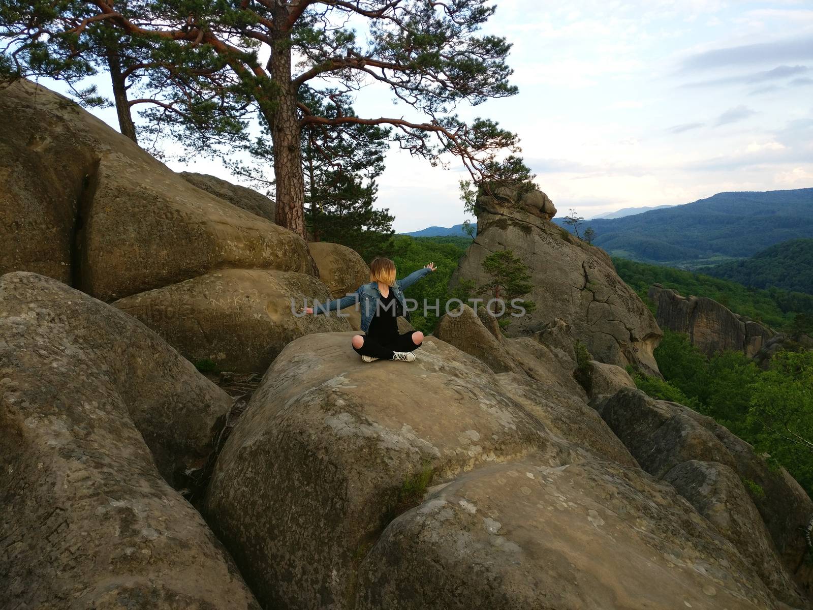 freedom girl in mountains - Landscape Dovbush rocks, Ukraine