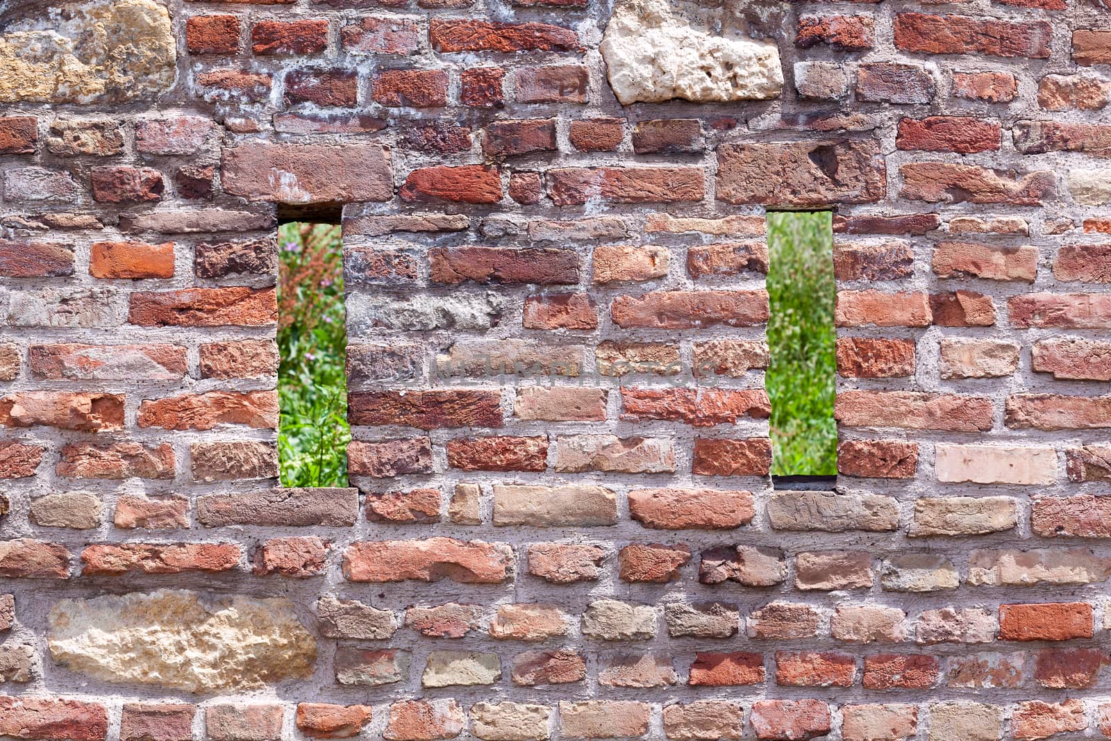 Brick and stone wall background by wellphoto