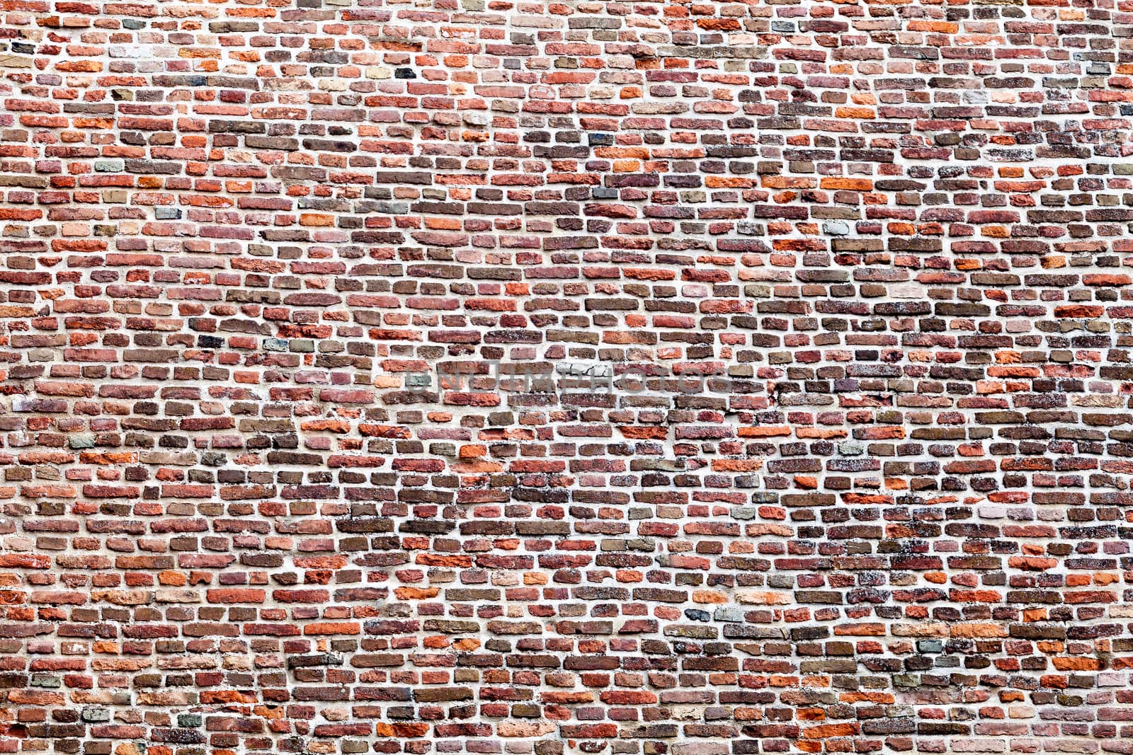 Brick wall background by wellphoto