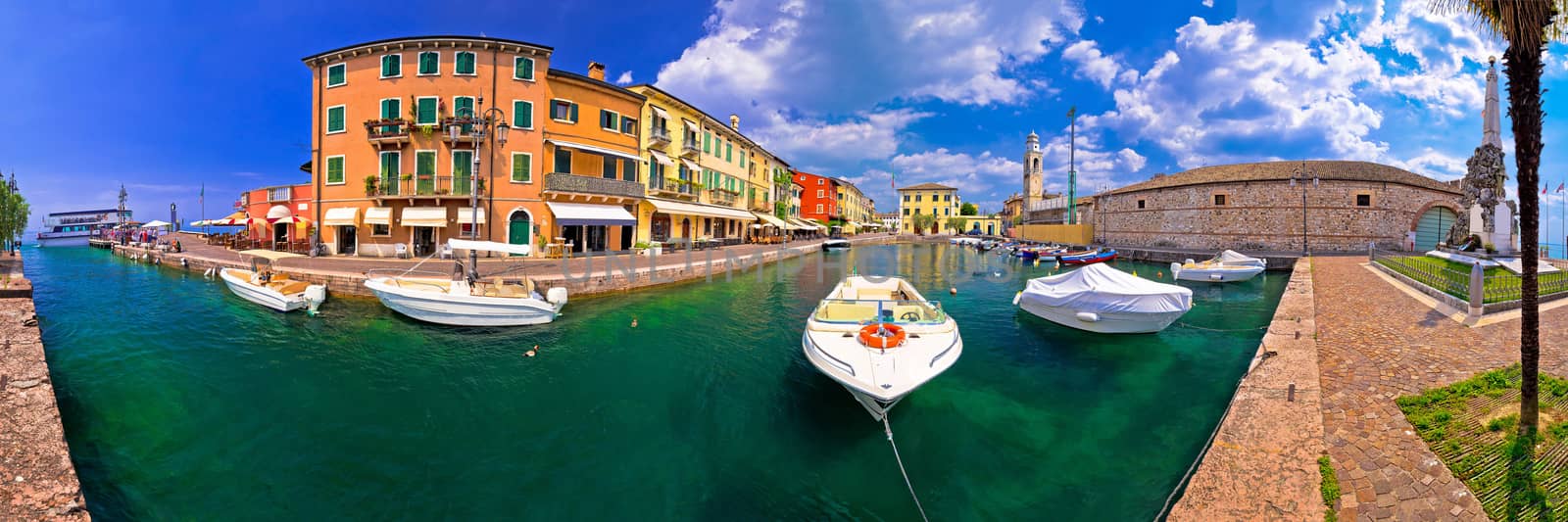 Lazise colorful harbor and boats panoramic view by xbrchx