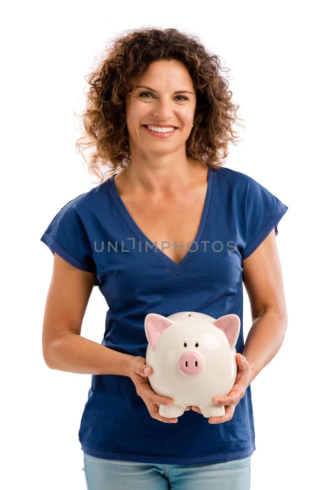 Portrait of a happy middle aged woman holding a Piggybank