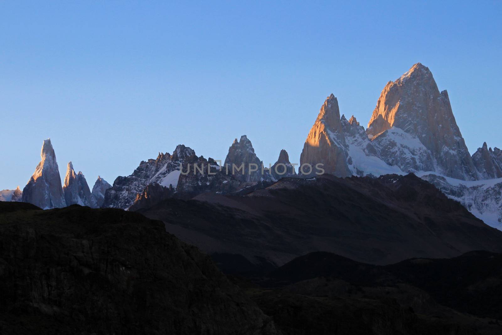 Fitz Roy and Cerro Torre mountainline at sunset, Patagonia, Argentina by cicloco