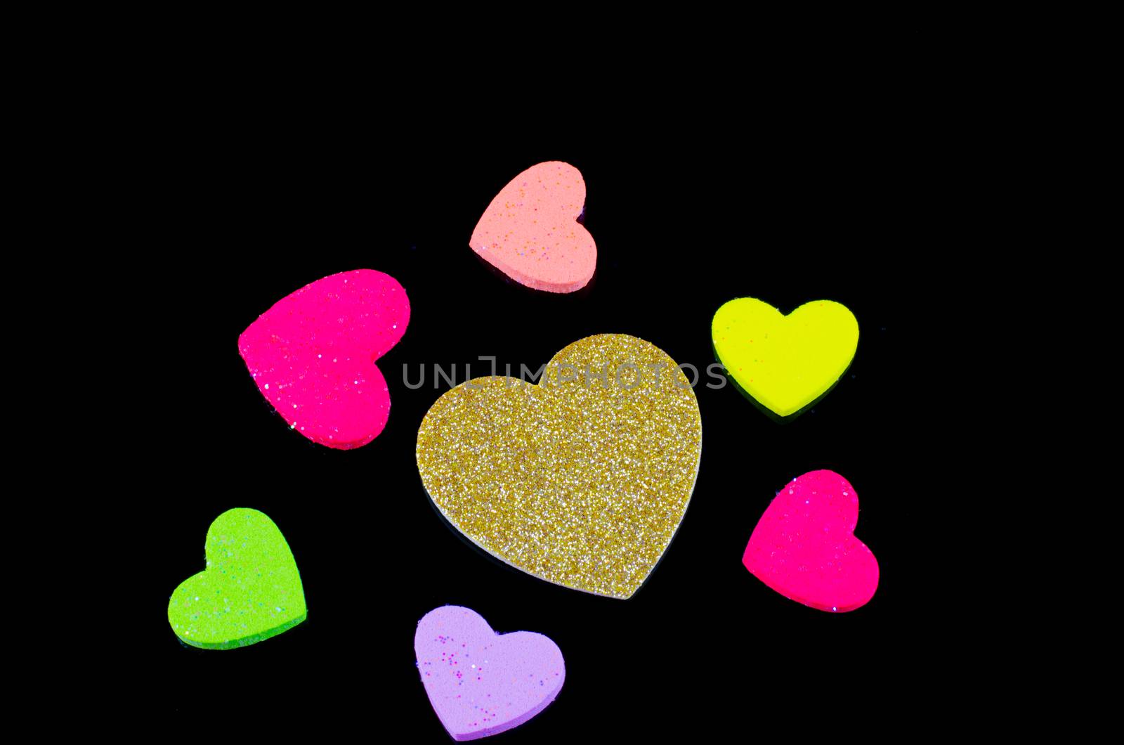 Heart of gold many colors Black background