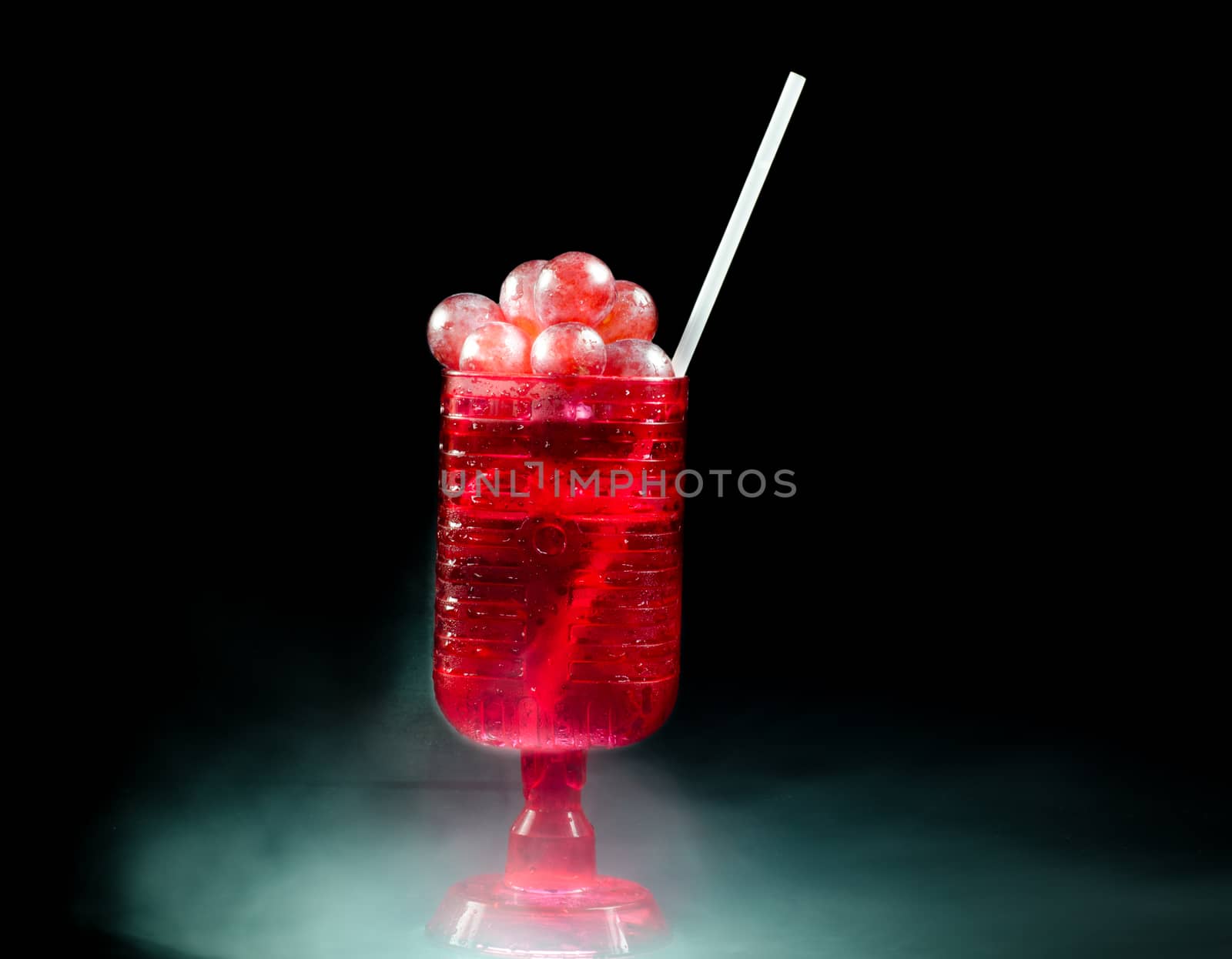 Glasses  red wine and  grape closeup a black background. by metal22