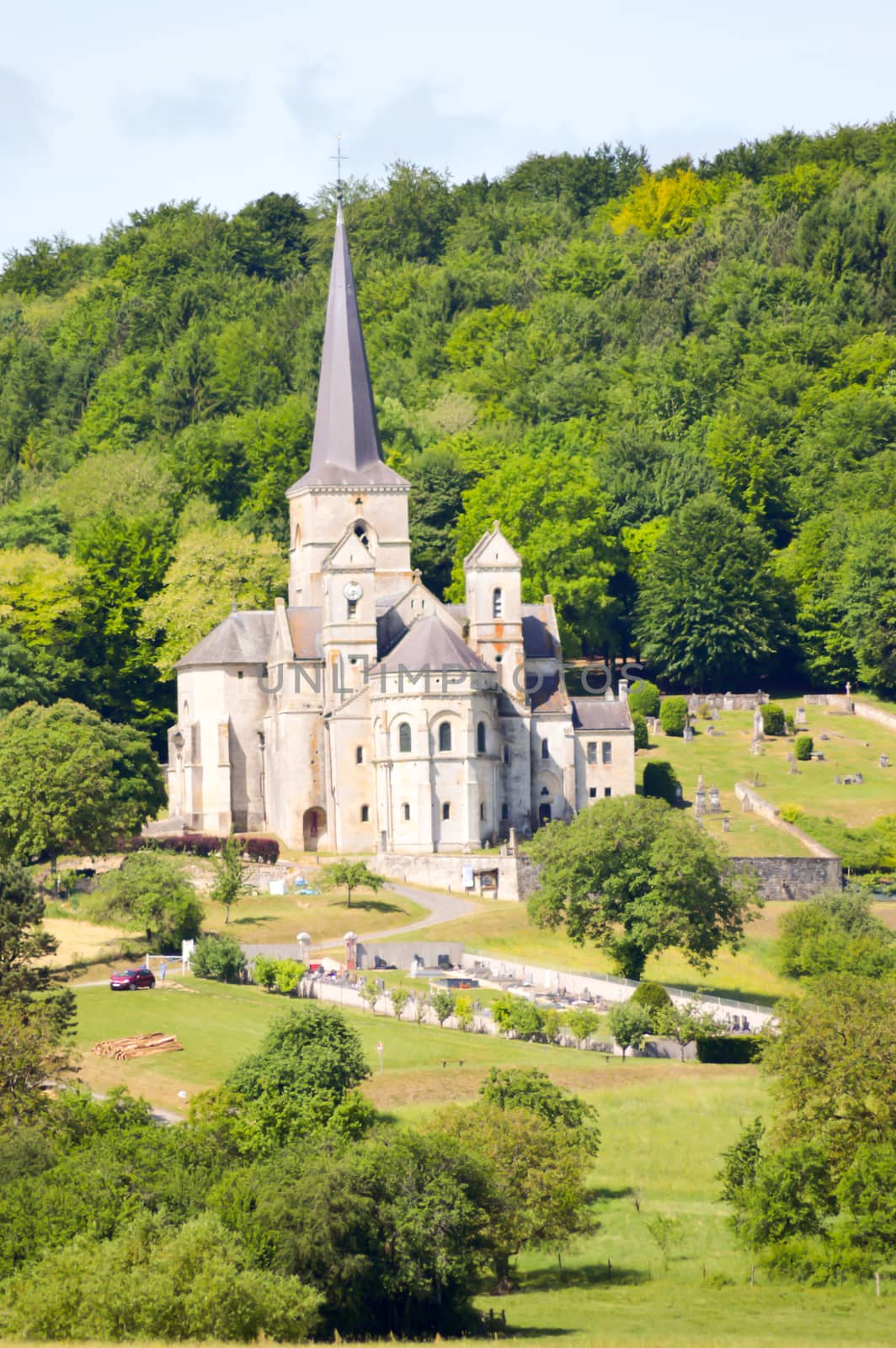 Cultures and church of Notre-Dame de Mont-Devant-Sassey in the department of the Meuse