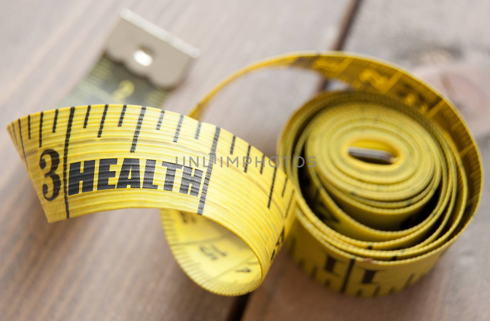 Close up of the word health printed on a tape measure