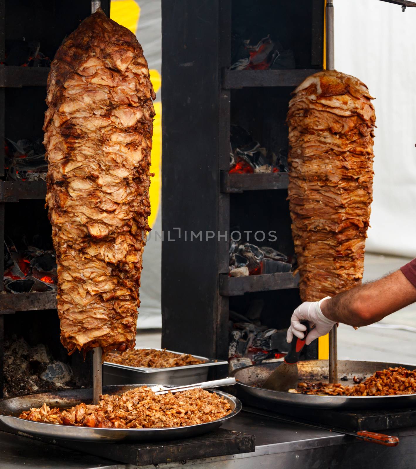 Closeup picture of stacked meat roasting, shawarma by Nobilior