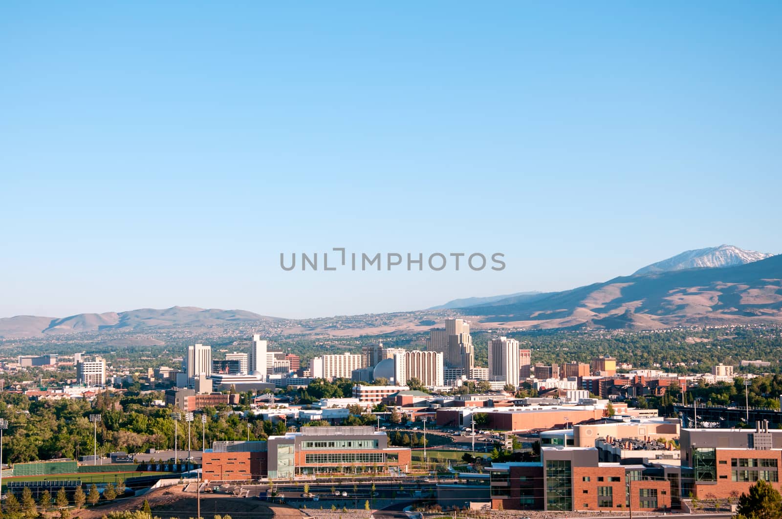 Image of the skyline of Reno, Nevada with the University of Nevada Reno in the foreground.