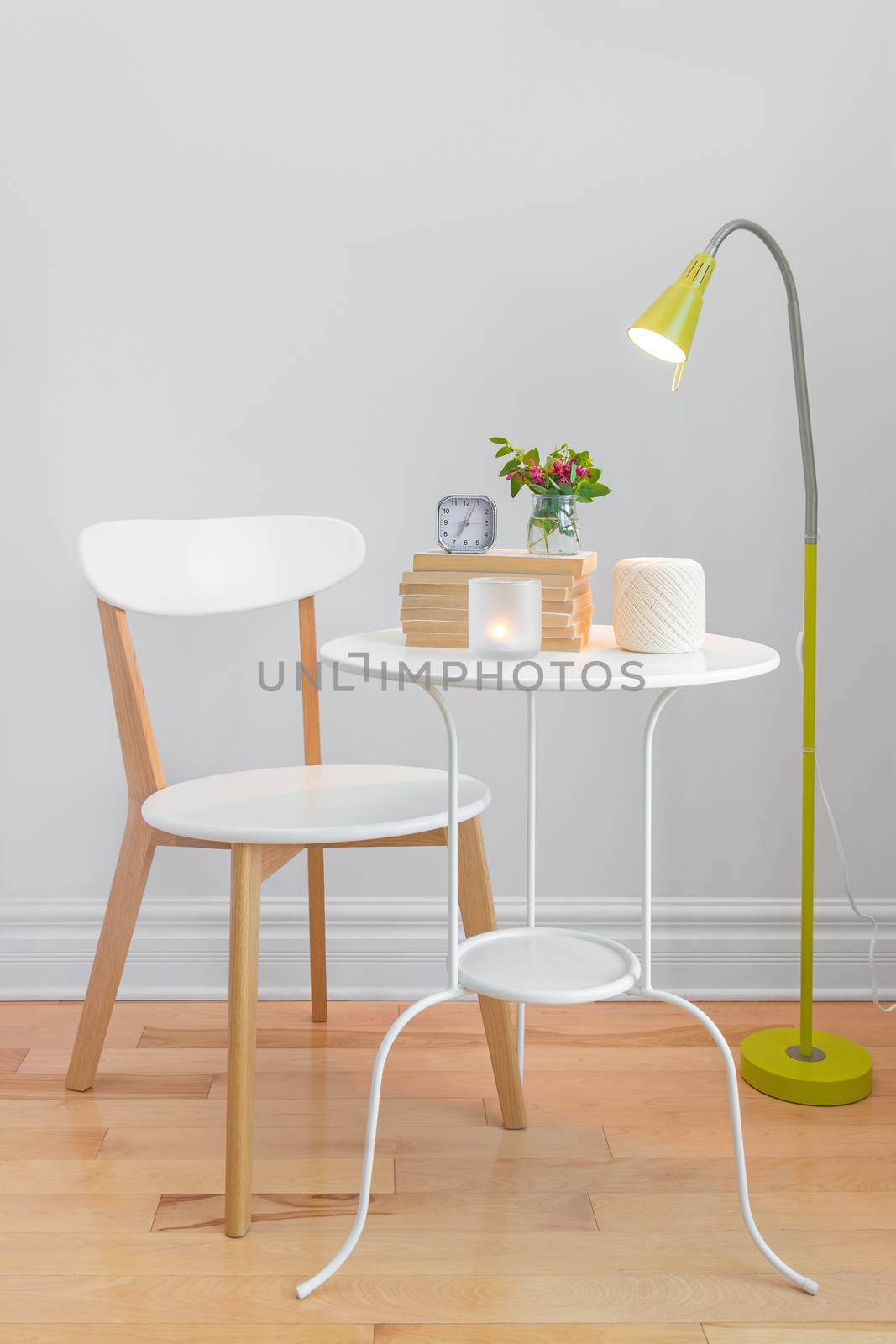Elegant home decor with modern furniture and floor lamp.