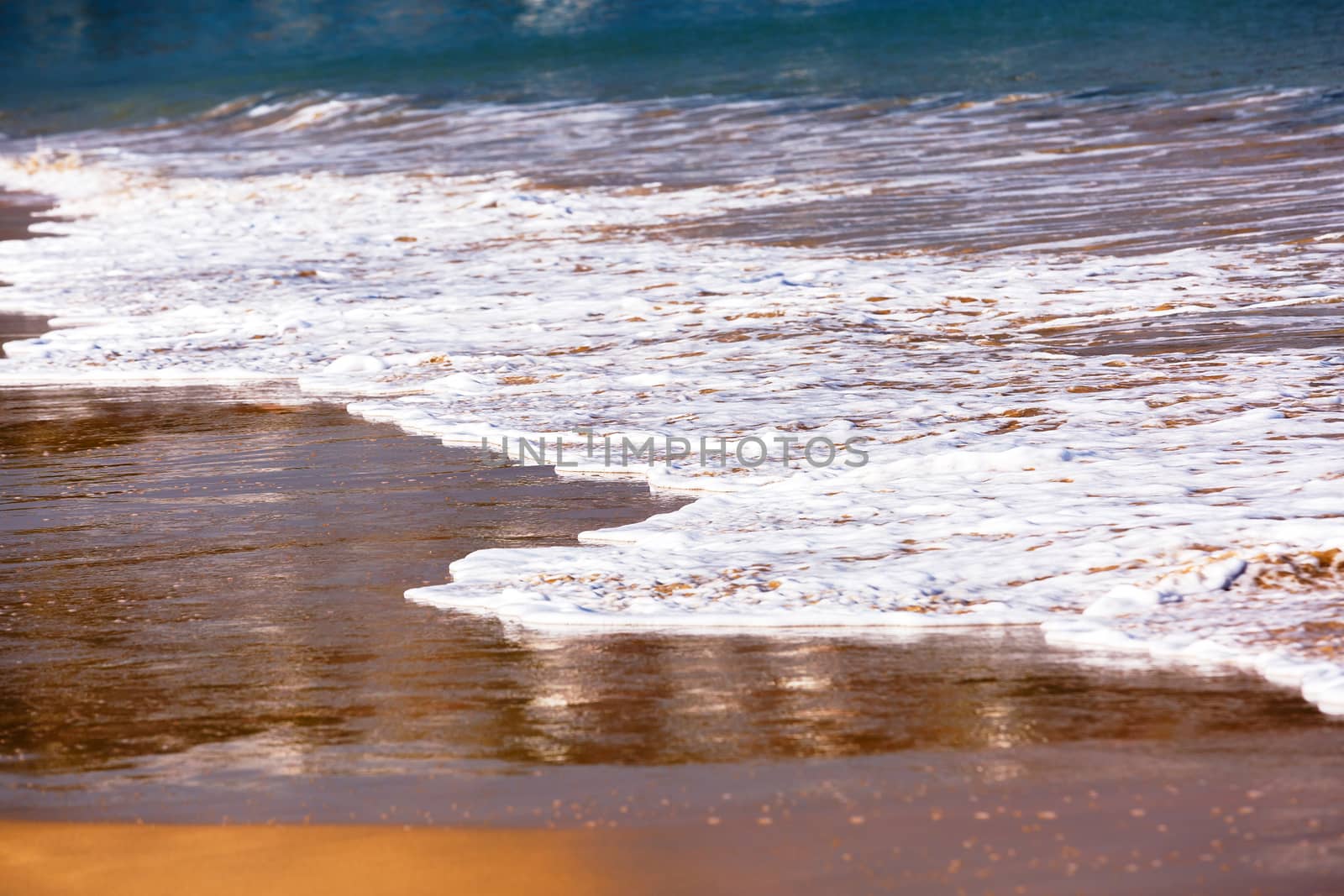 Soft wave of the sea on the sandy beach