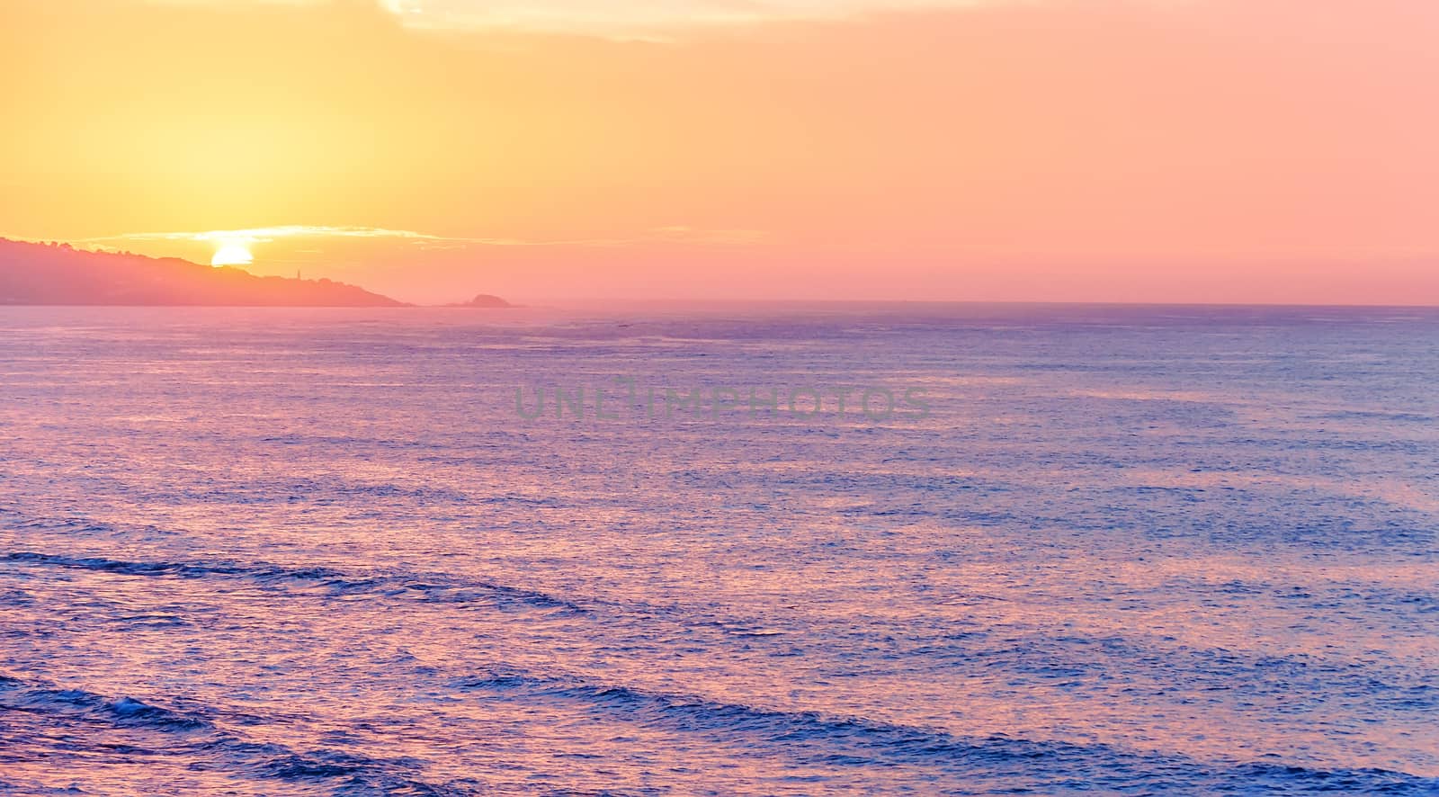 Panoramic sea Cliff on sunrise with beautiful dramatic sky and ocean shore on the background