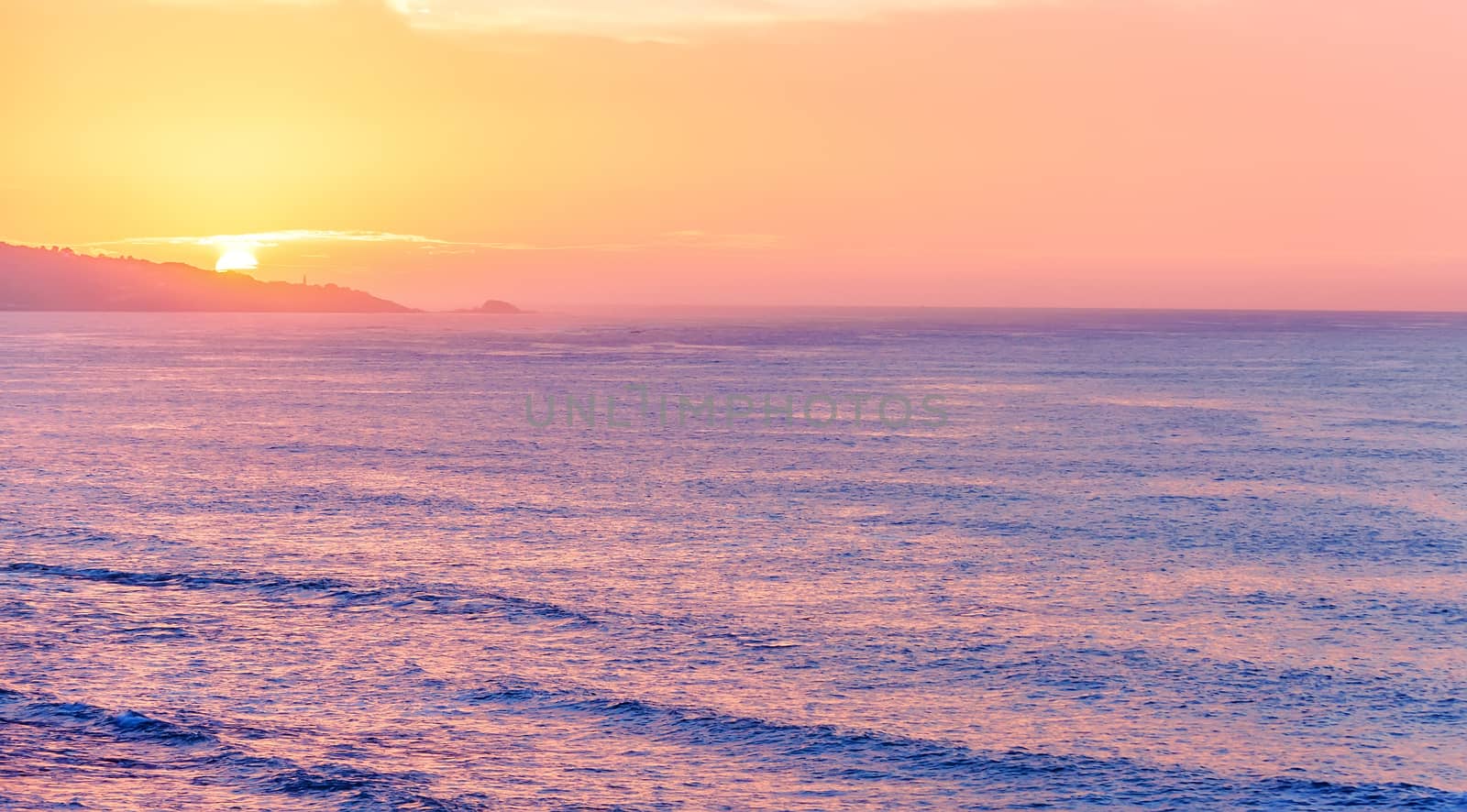 Sea Cliff on sunrise with beautiful dramatic sky and ocean shore by pixinoo