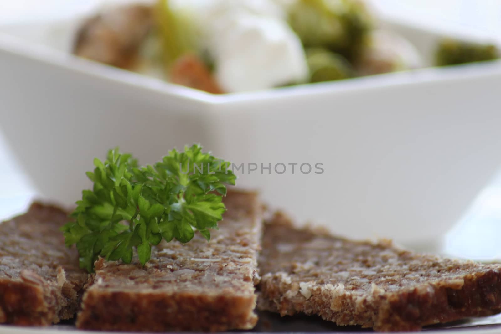 Sandwich with black bread on the background of the chicken salad by Kasia_Lawrynowicz