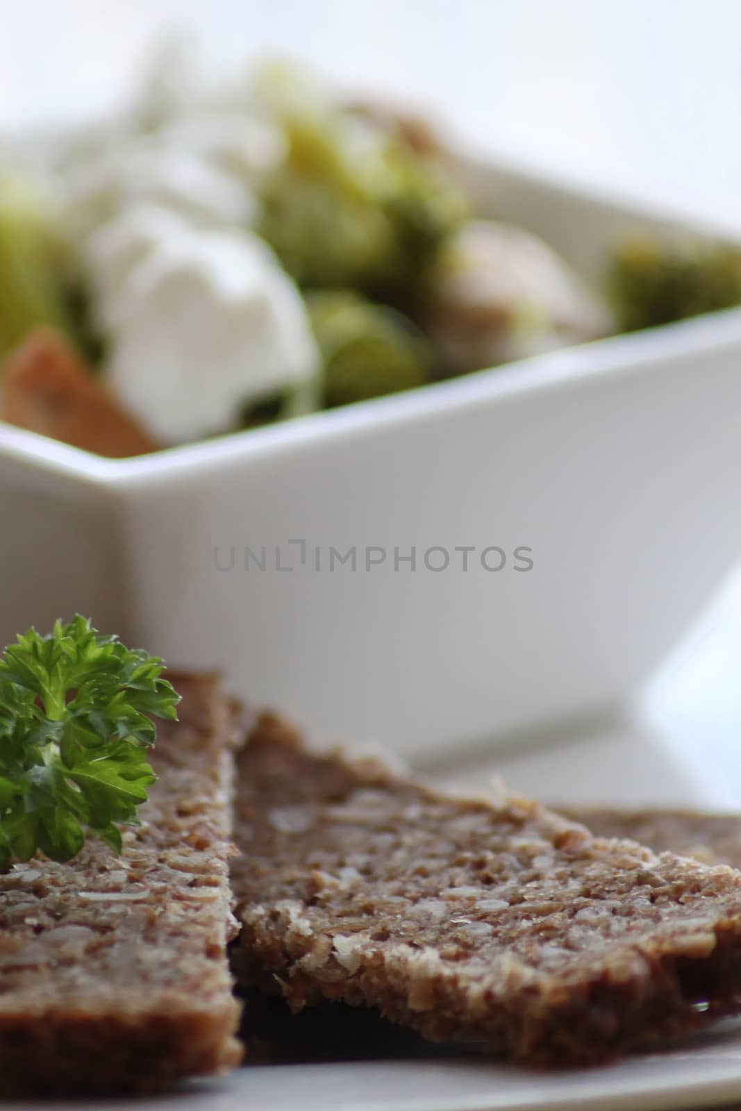 Sandwich with black bread on the background of the chicken salad by Kasia_Lawrynowicz