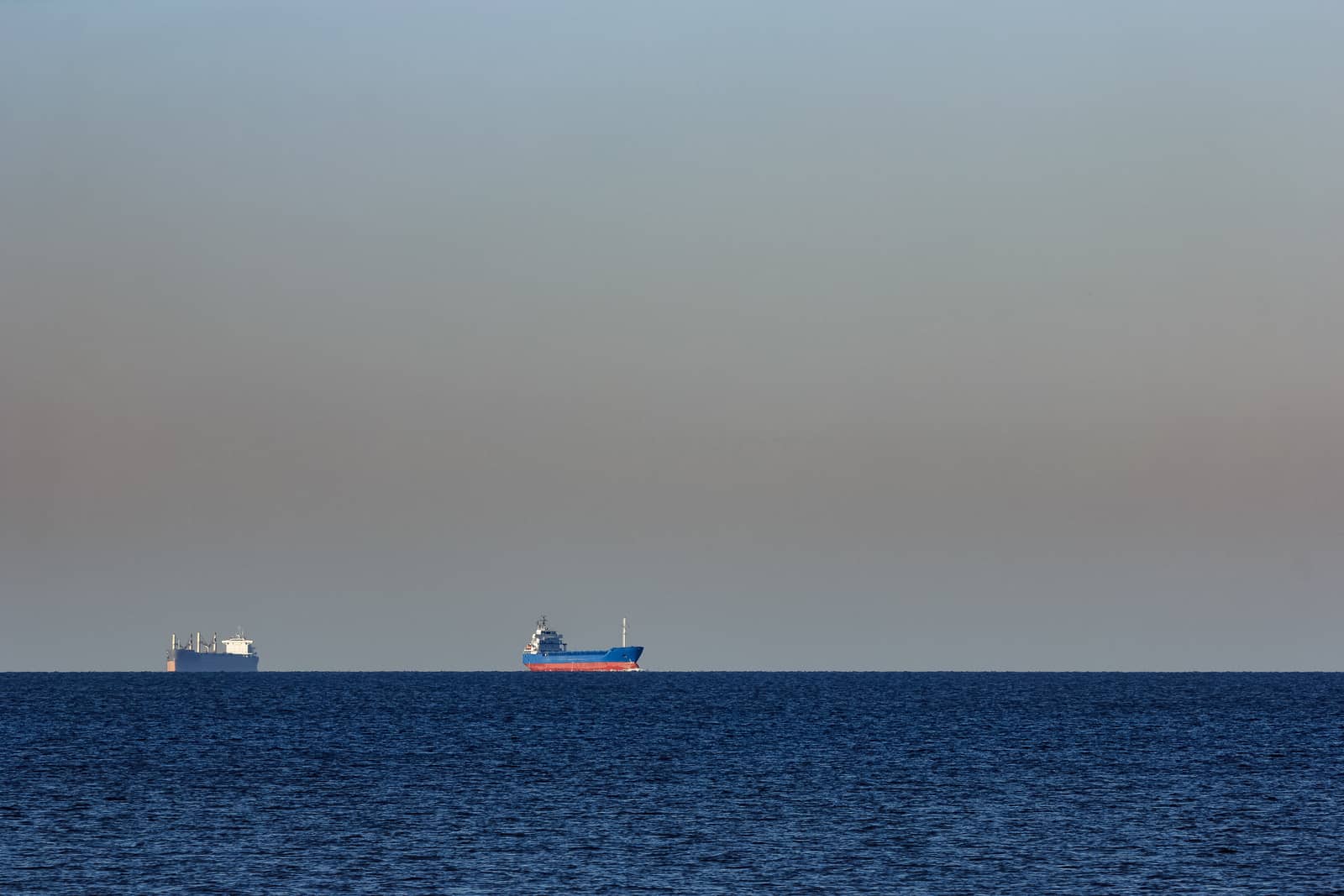 Blue cargo ship sailing from the Baltic sea
