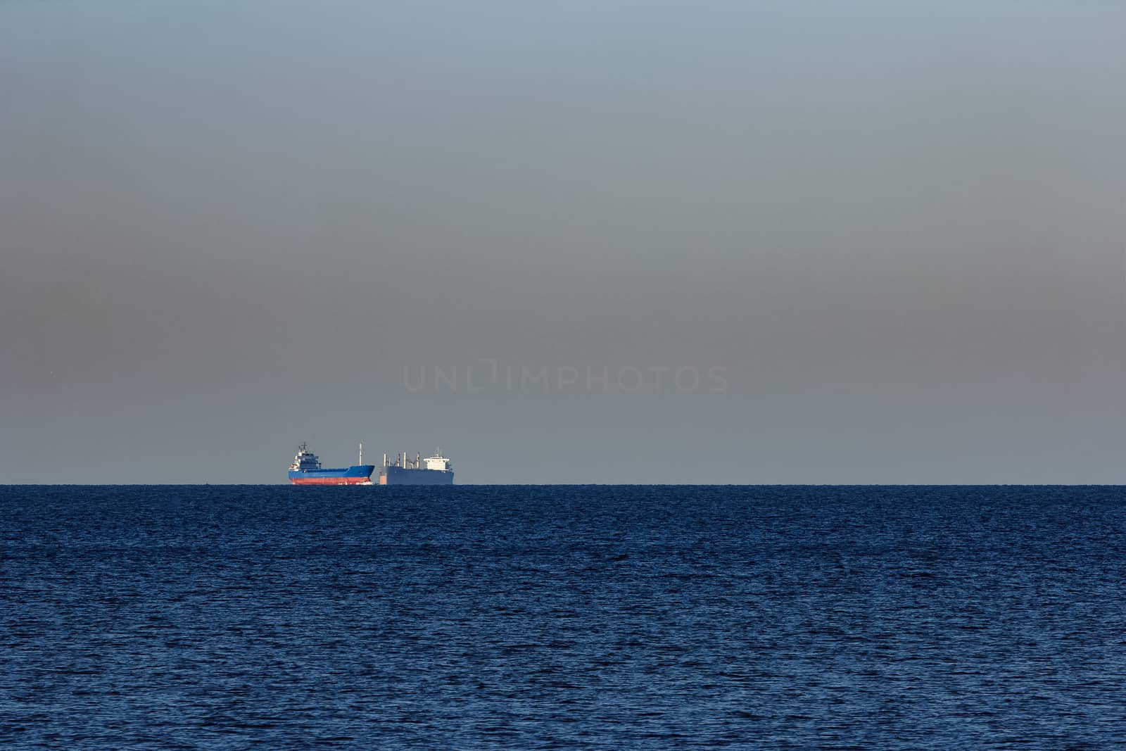 Blue cargo ship sailing from the Baltic sea