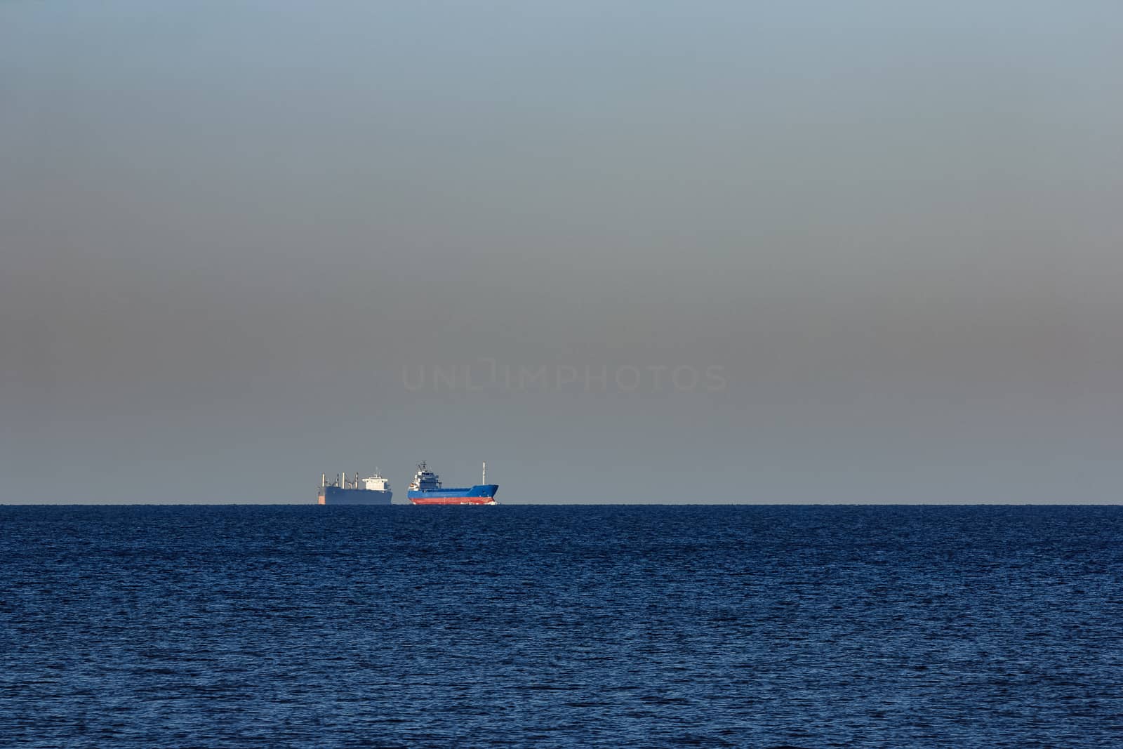 Blue cargo ship sailing from the Baltic sea