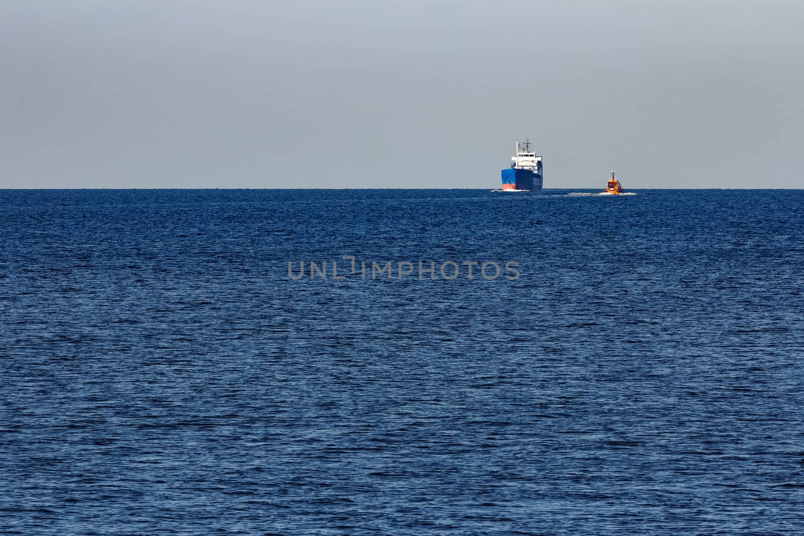 Blue cargo ship sailing from the Baltic sea