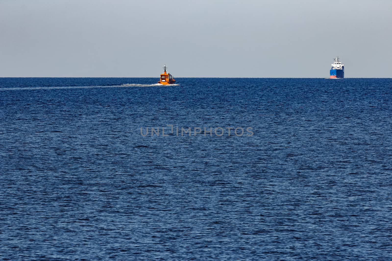 Blue cargo ship sailing from the Baltic sea
