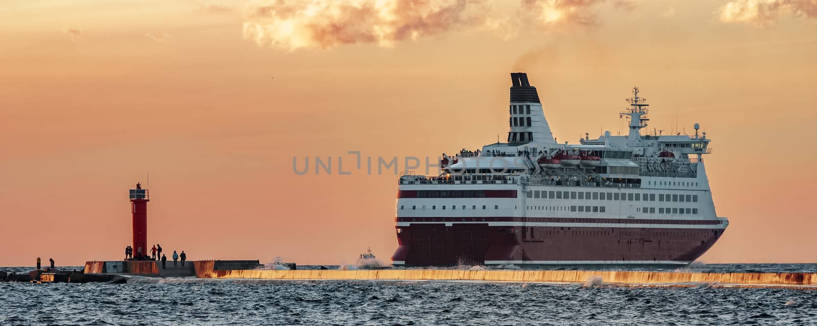 Red cruise liner. Passenger ferry sailing from Riga to Stockholm
