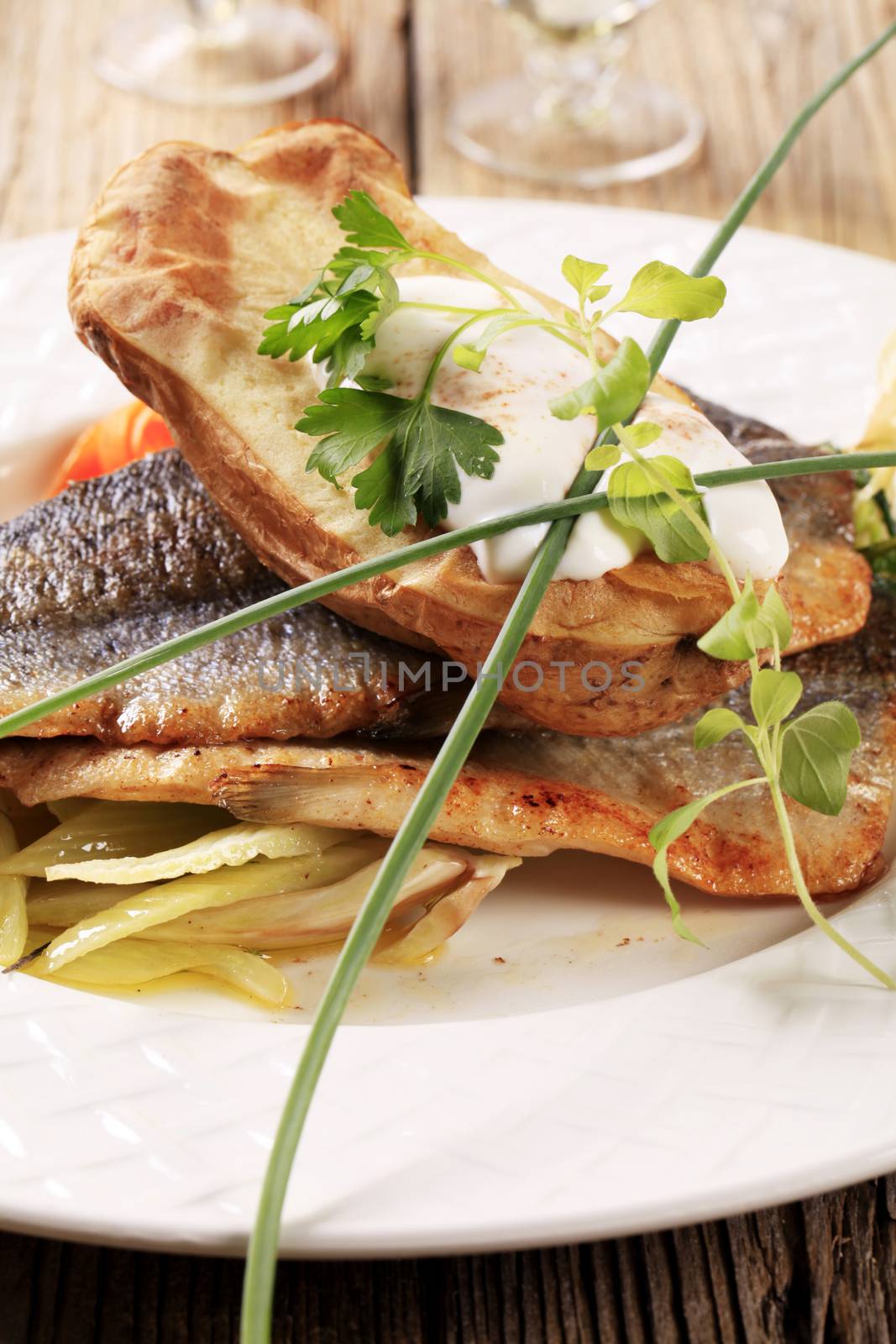 Pan fried trout fillets and baked potato