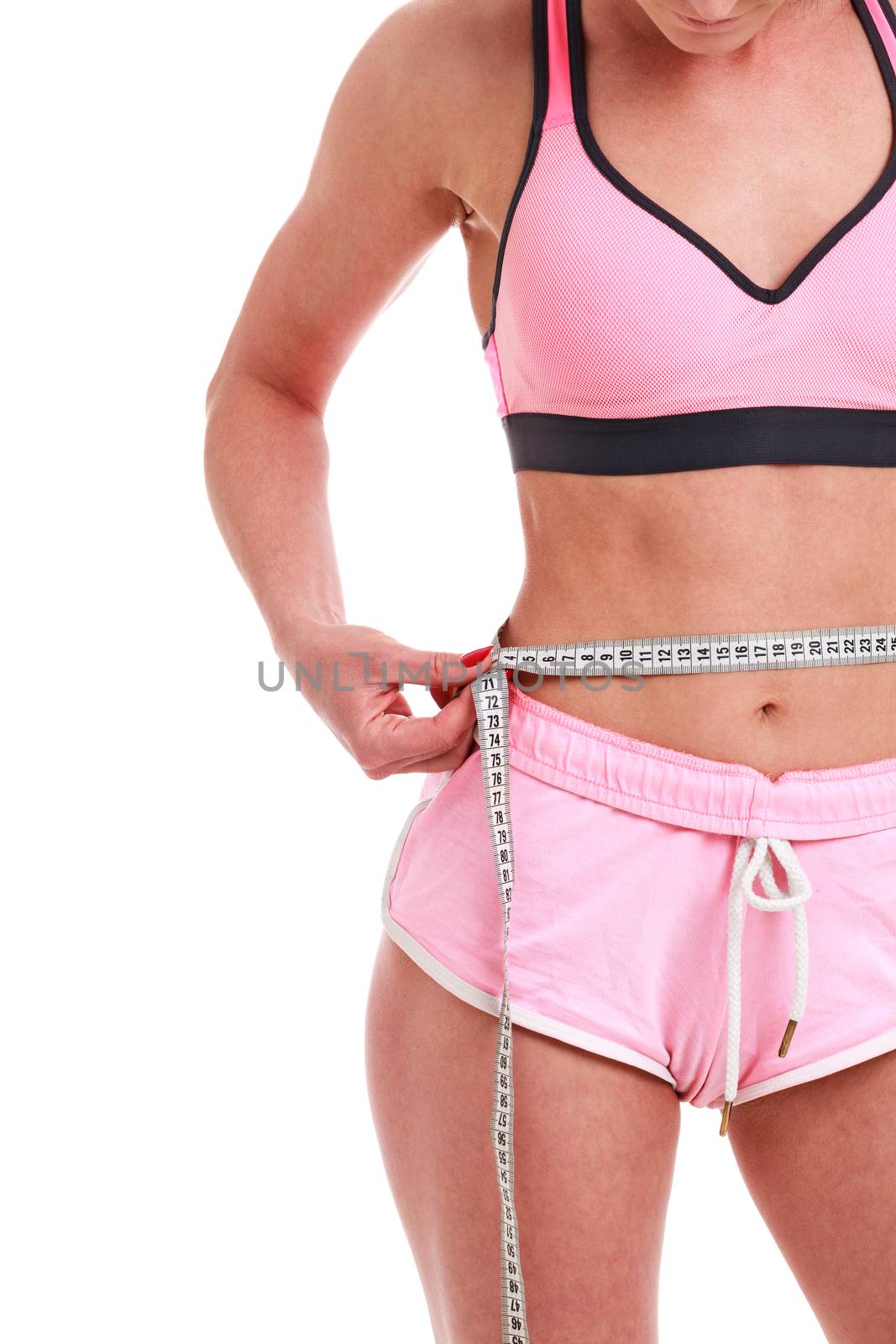 Fitness woman with measure tape isolated on white background