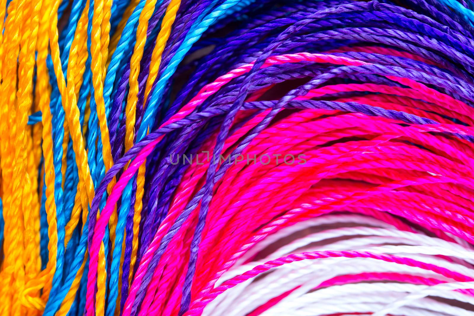 colorful thread close up background. clothes fabric