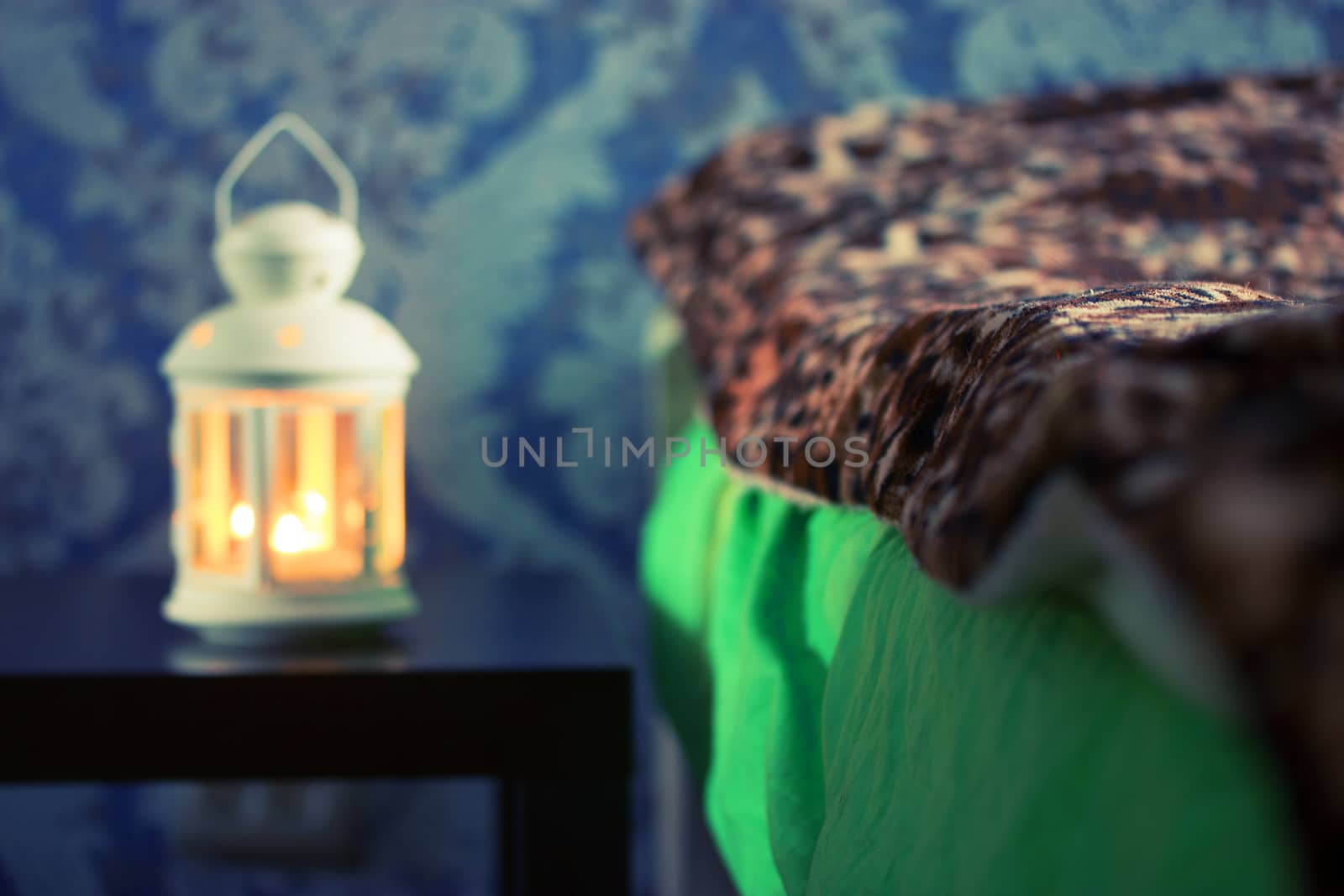 beautiful lantern near the bed. romantic concept